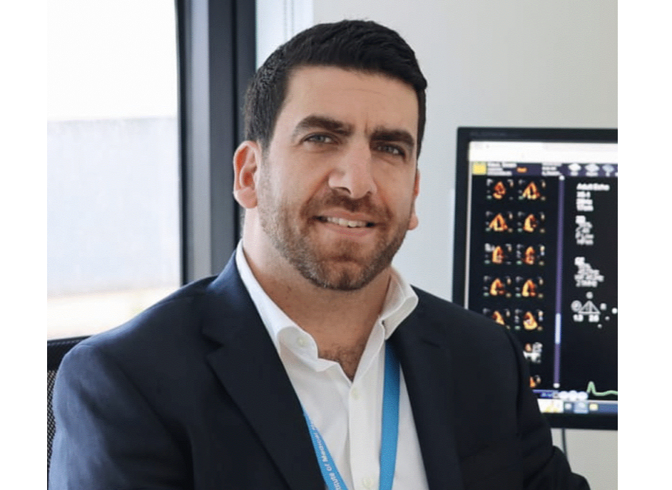 Researcher wearing a suit sitting in office